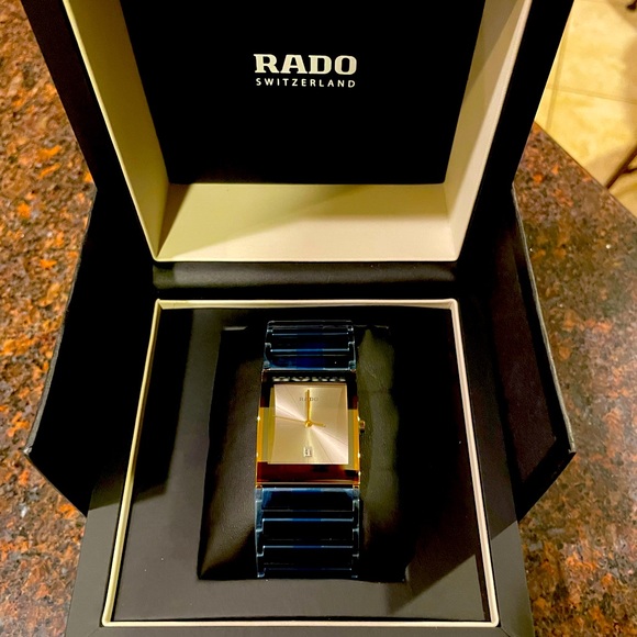 Beautiful men’s gold Rado Swiss watch.